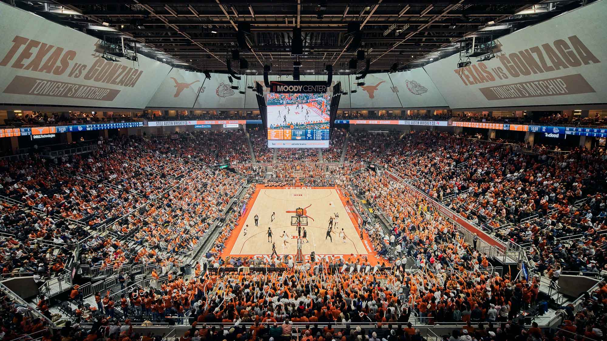 A basketball court in a stadium.