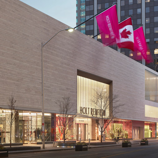 A building with flags on the side.