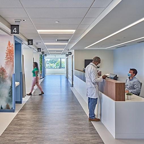 Henry Ford Health System Plymouth Medical Office hallway view with check-in and rooms.