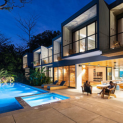 Surf Simply resort poolside at night