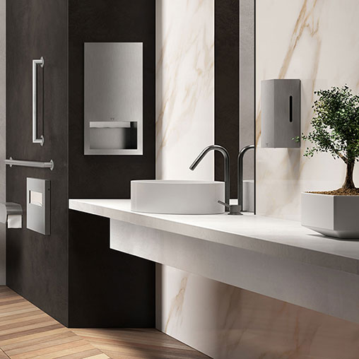 A bathroom with a sink and a plant.