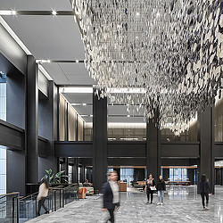 People walking inside Willis Tower lobby