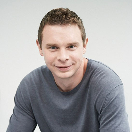 A man smiling for the camera.