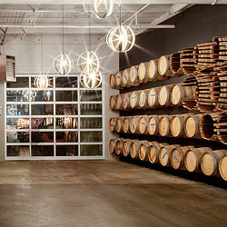 A room with a large display of glass and lights.