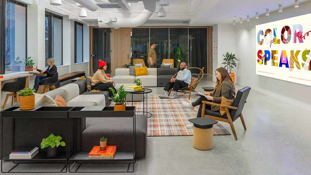 A group of people sitting in a room.