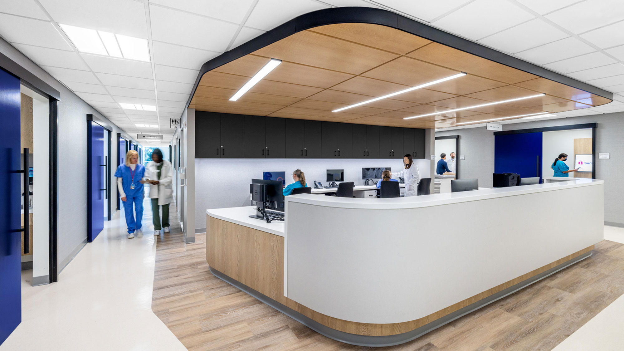 A group of people in an office.