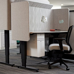 Office cubicle and chair. Credit: Fast Company