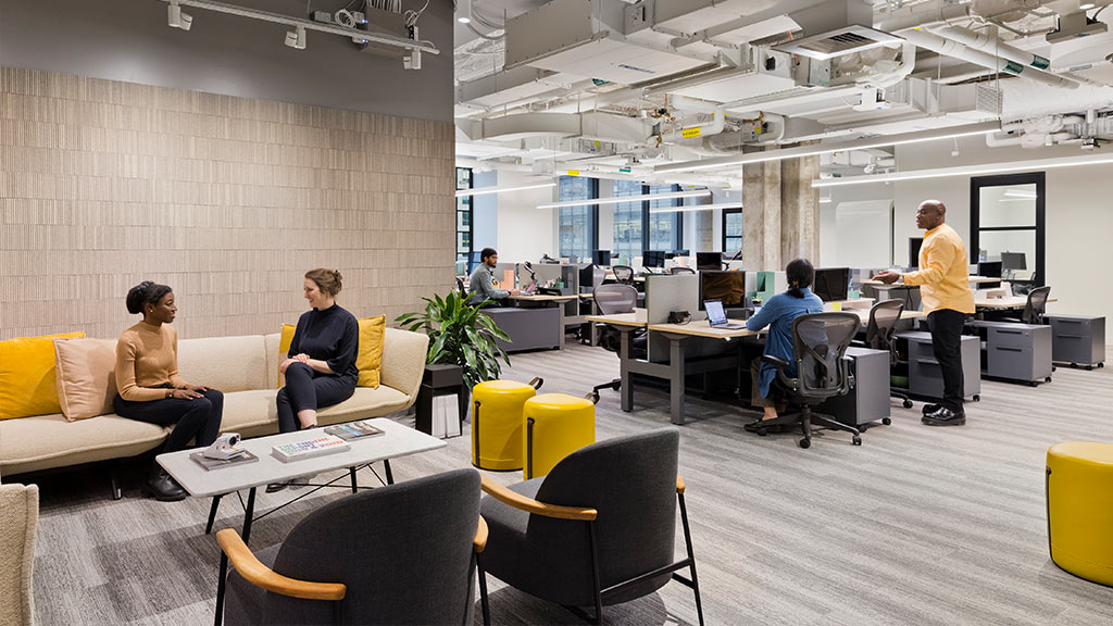 A group of people in an office.