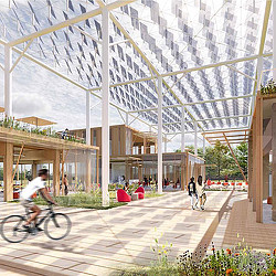 A person riding a bicycle under a covered walkway.