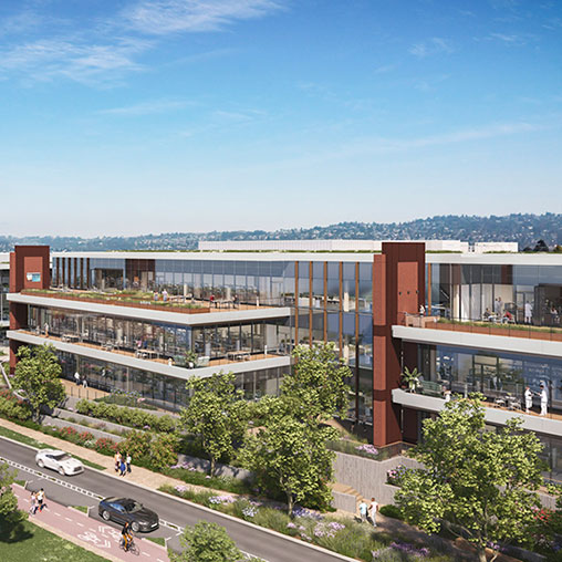 A large building with a parking lot.