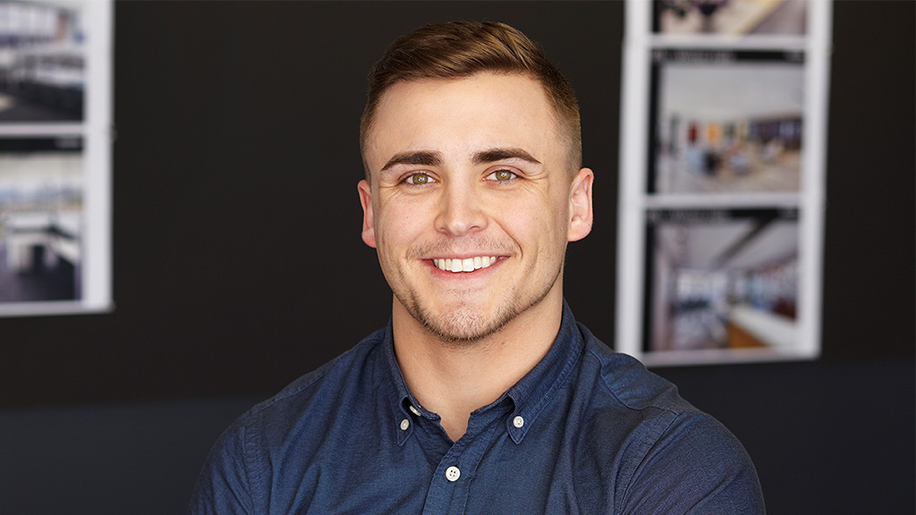 A man smiling for the camera.