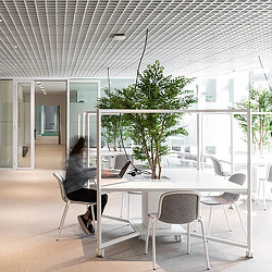 A woman working on her laptop in Korn Ferry Paris office