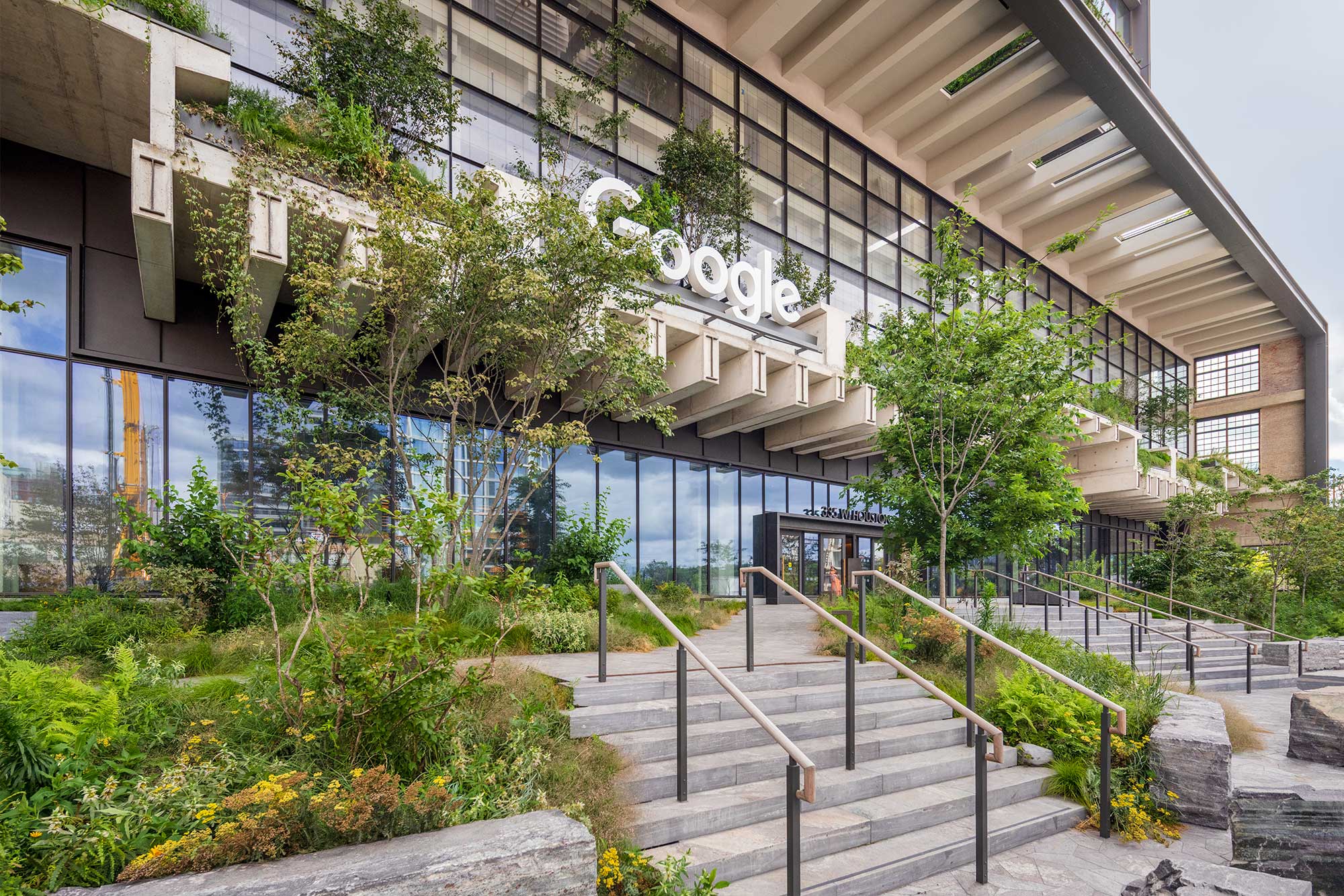 St. John's Terminal Google headquarters building entrance with greenery