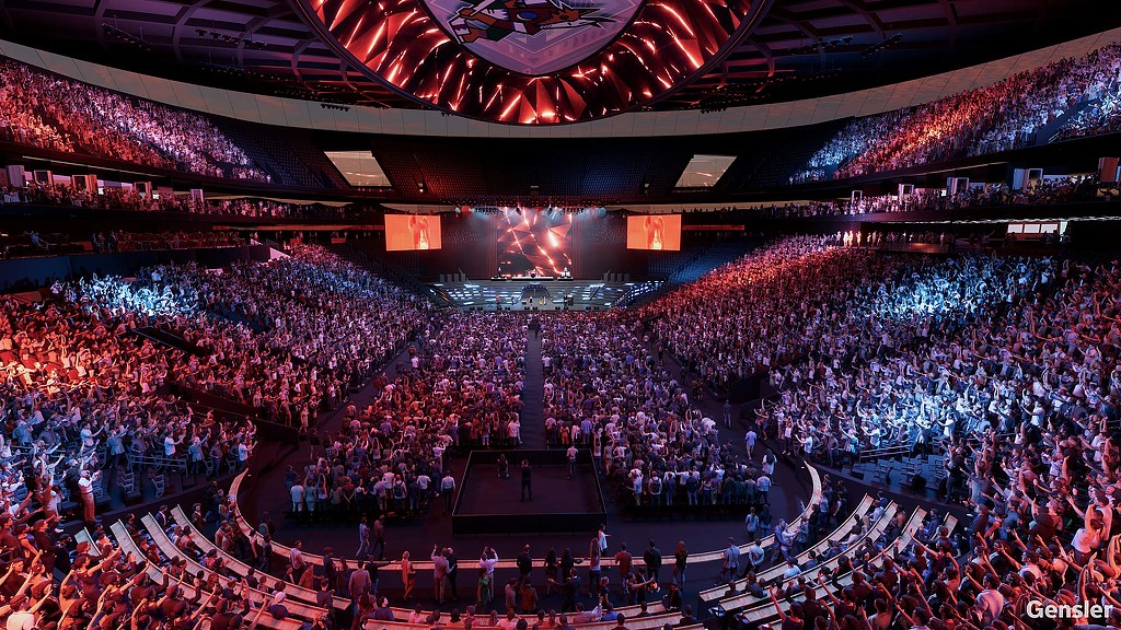 A large crowd of people in a stadium.