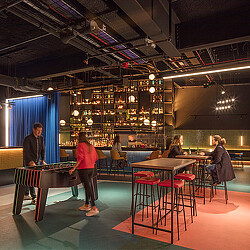 TOCA Social interior with bar and foosball table