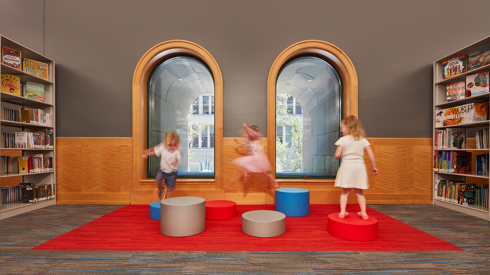 A group of children playing on balls.