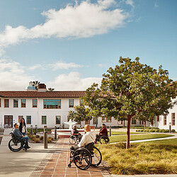 A group of people riding bikes.