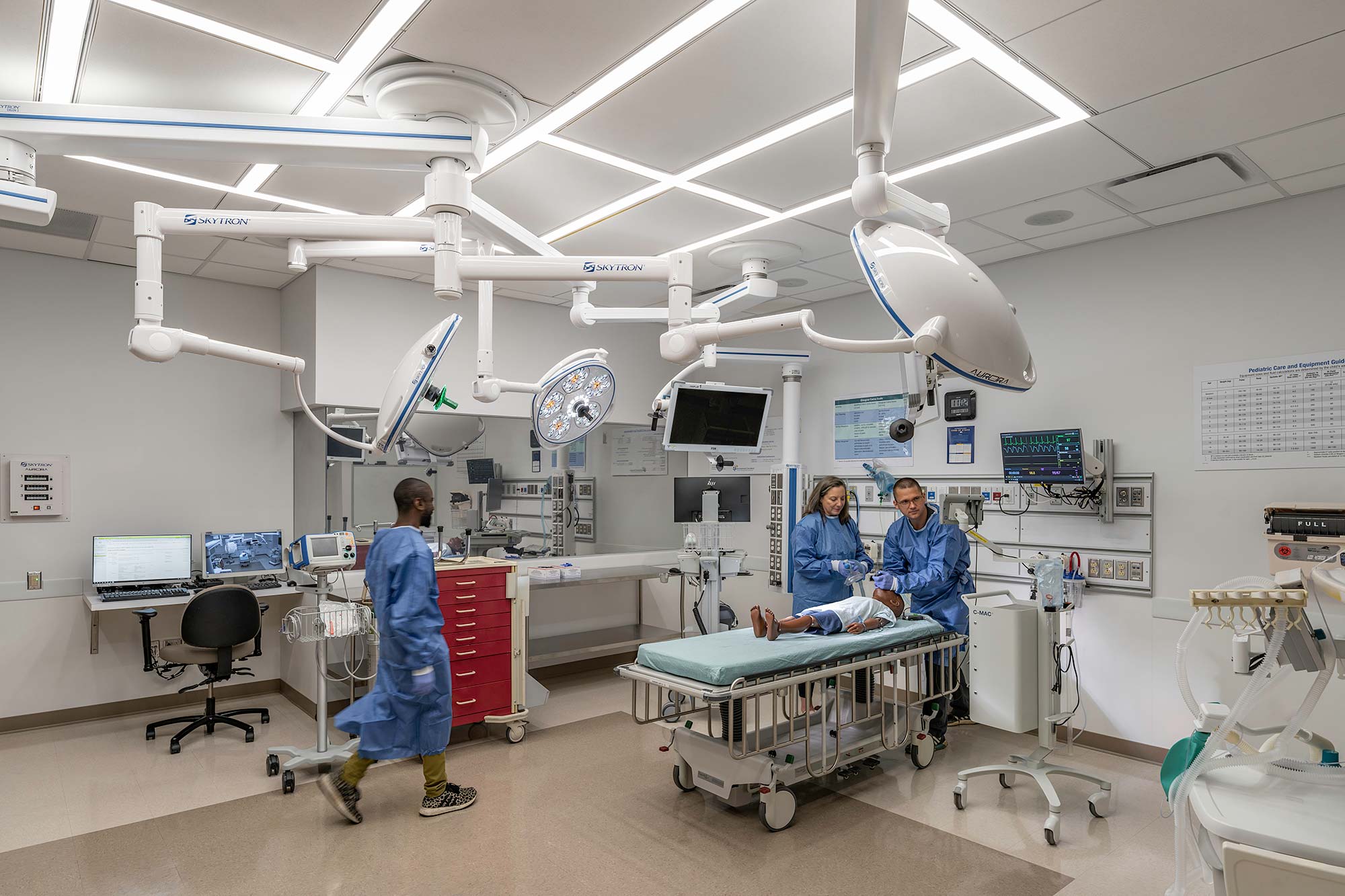 A group of people in a hospital.