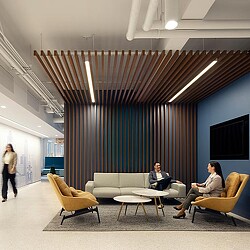 A man and woman sitting in chairs.