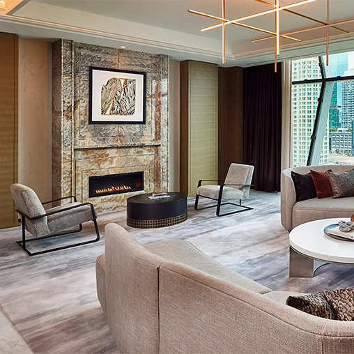 A living room with a fireplace.