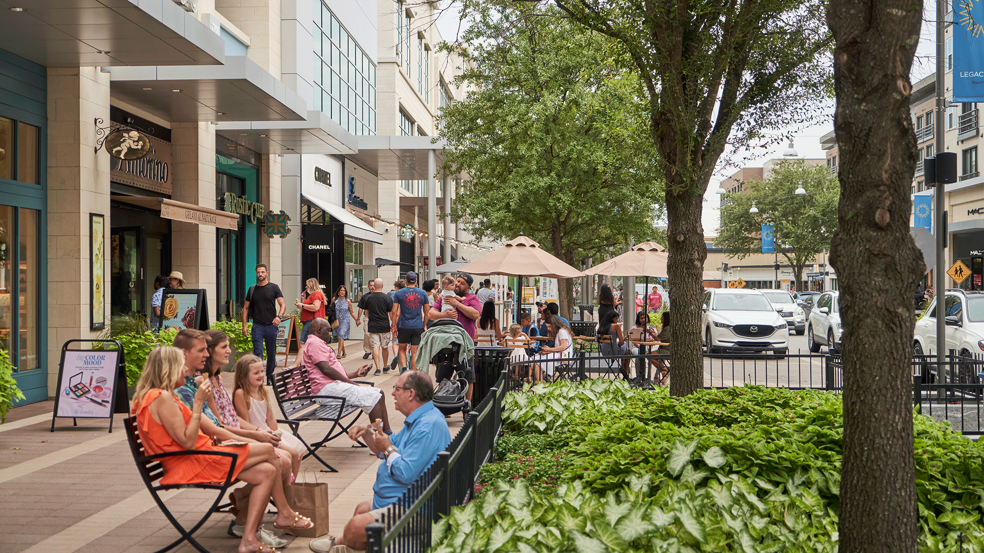 A group of people sitting outside.