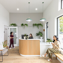 Open Wellness reception area with cozy seating