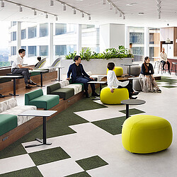 A group of people sitting in a room.