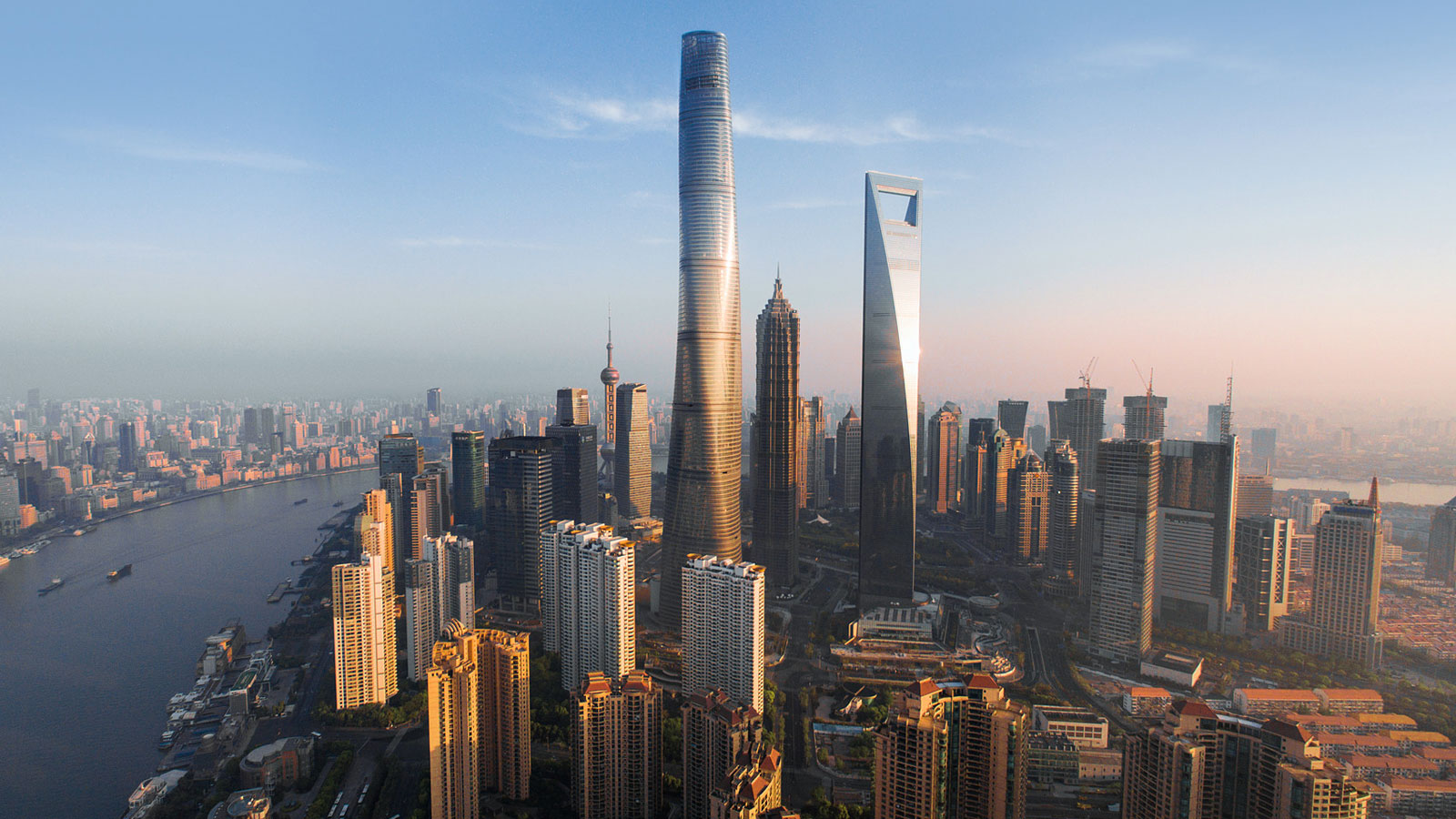 Shanghai Tower with tall buildings.