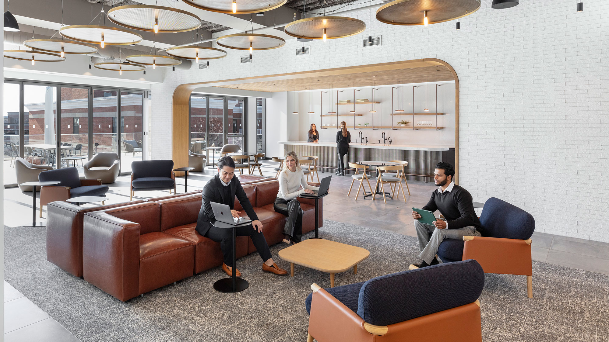 A group of people sitting in chairs.