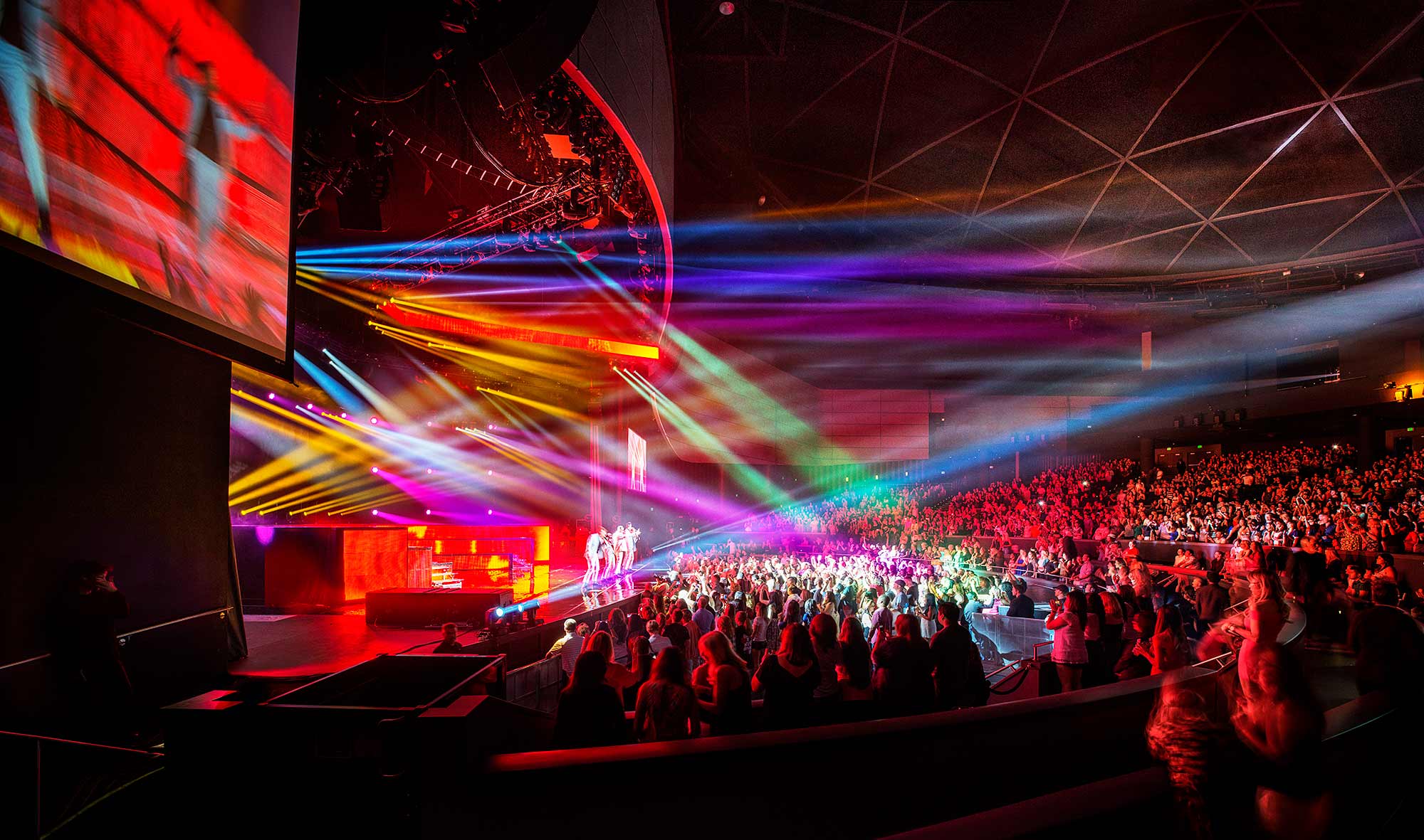 A stage with a crowd of people.