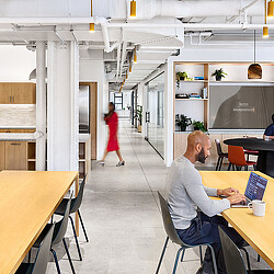 A man and woman in a restaurant.