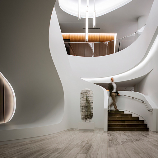A person standing on a staircase.