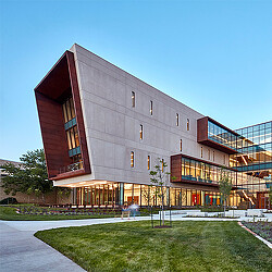 A building with a lawn in front of it.