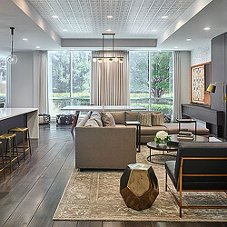 A living room with a large window.