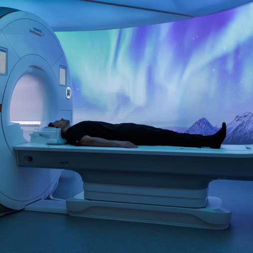 A person lying in a bed.