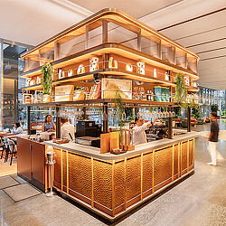A bar with a large display of glass and wood.
