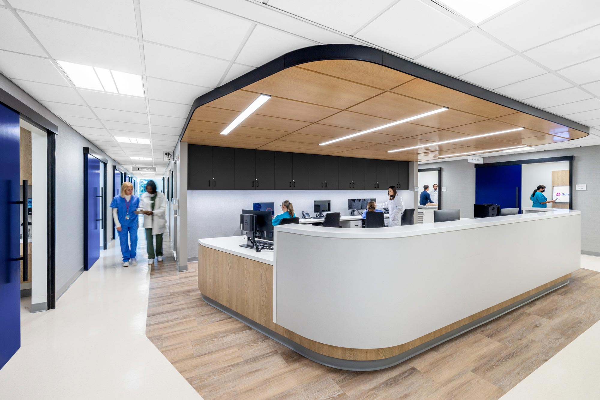 A group of people in an office.