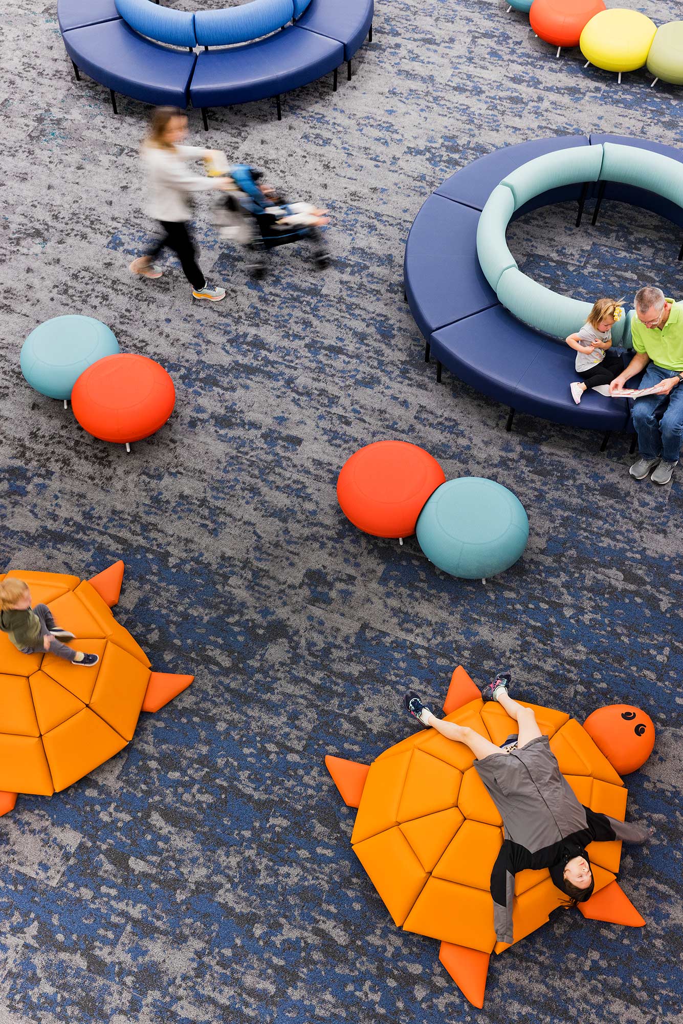 People playing with colorful balls.