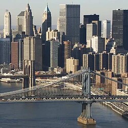 A bridge over a river in a city.
