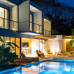 Surf Simply Resort poolside at night