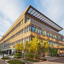 A building with trees in front of it.