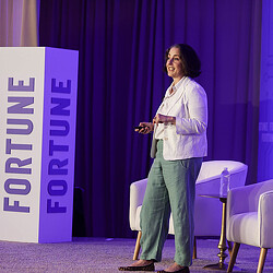 Gensler Co-CEO Elizabeth Brink speaking on stage at Fortune Workplace Innovation Summit 2025