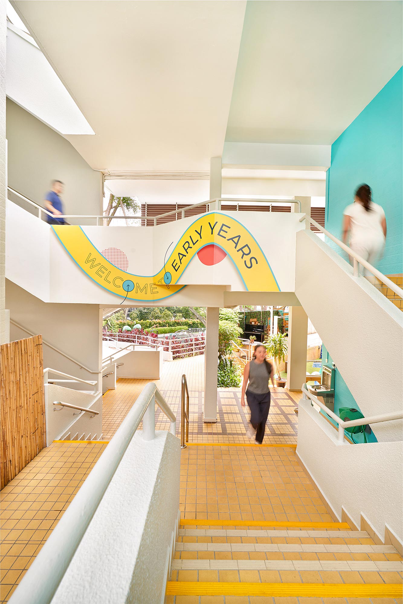 A person walking down a flight of stairs.
