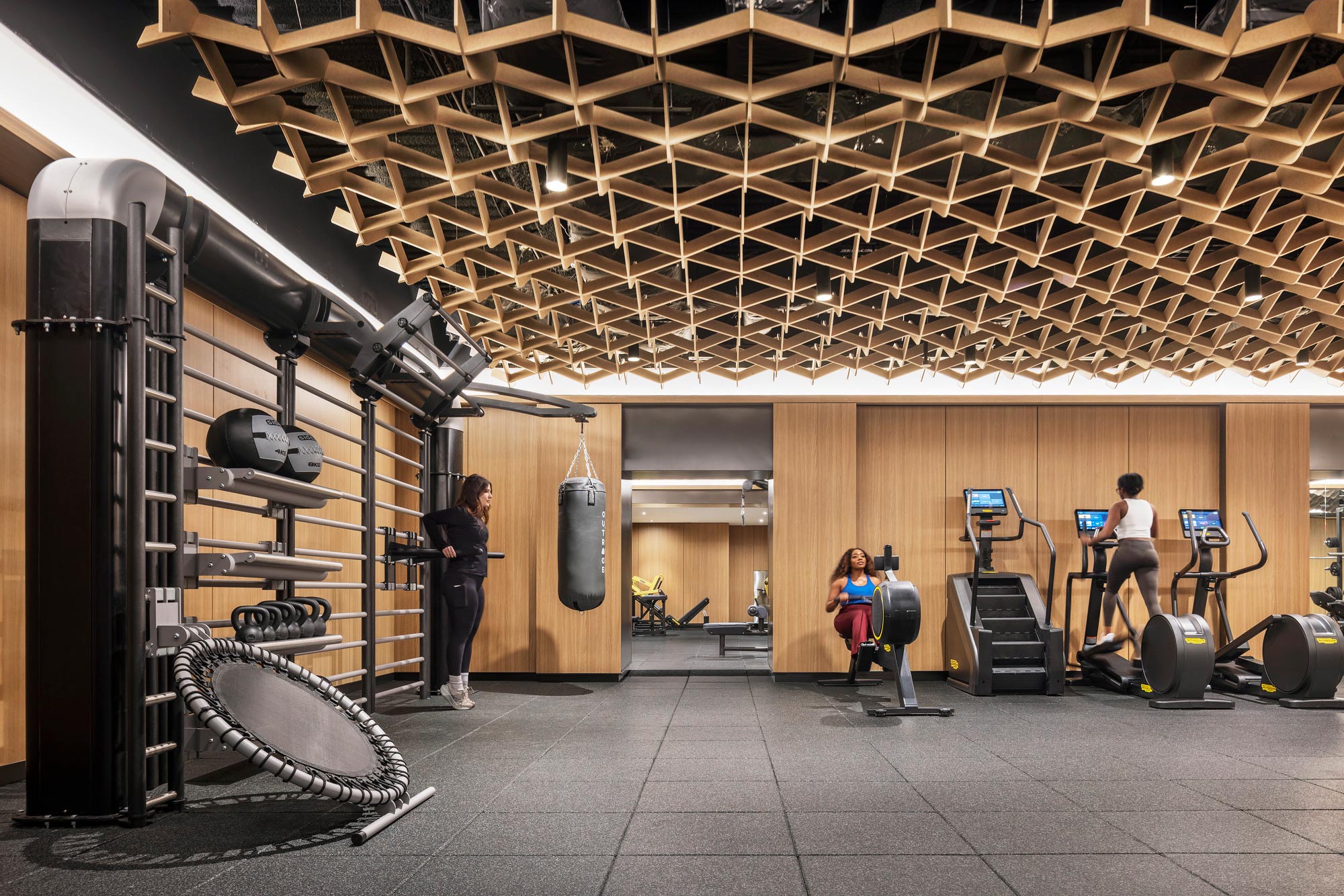 People in a room with equipment.