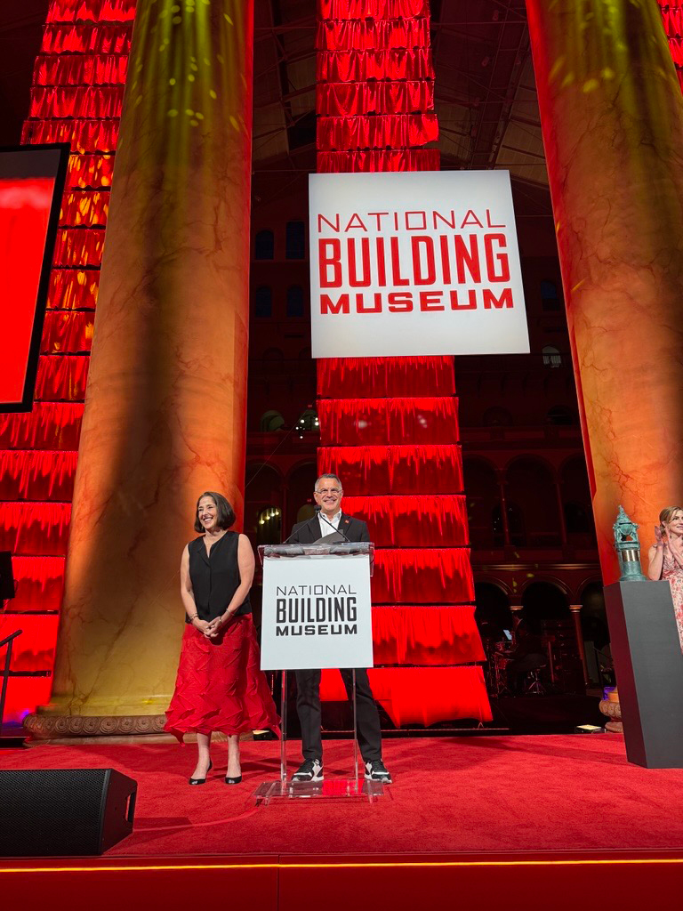 A man and woman on a stage.