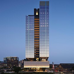 A tall building with many windows.