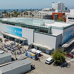 A large group of people outside a building.