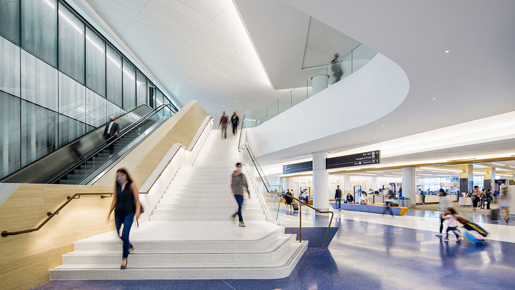 People walking down a flight of stairs.