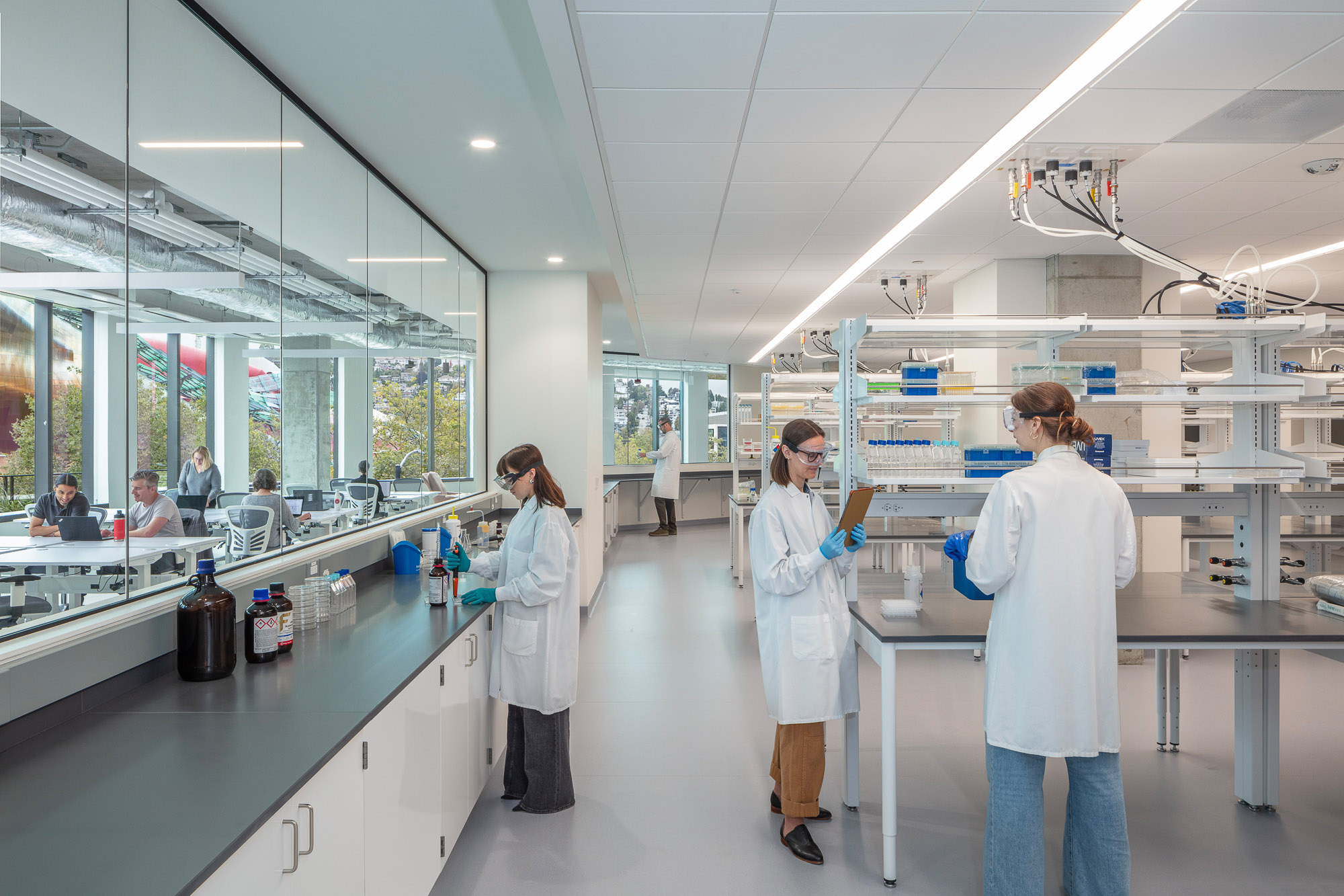 A group of people in lab coats.