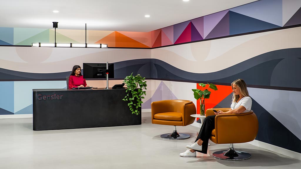 A couple of women are working in the Vancouver office space.